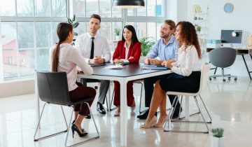 Human resources commission interviewing woman in office